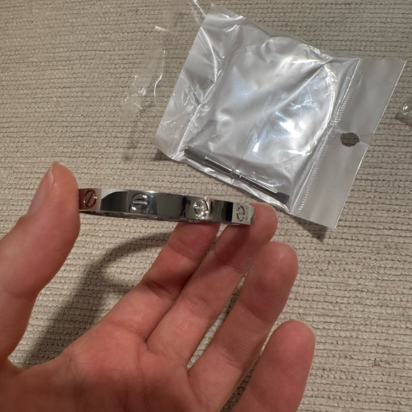 319. Stainless Steel Hold Plated Silver Bangle Bracelet - Picture 4 of 4